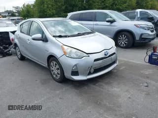 ✅ 2013 Toyota Prius Two • VIN: JTDKDTB31D1034034 • Lot: 43332392. Listed on IAAI with 107,418 mi. Free auction sales archive from the USA and detailed vehicle history report at DreamBid. Image 1.