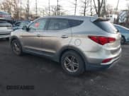 ✅ 2017 Hyundai Santa Fe 2.4L • VIN: 5XYZTDLB0HG396729 • Lot: 43859049. Listed on IAAI with 119,122 mi. Free auction sales archive from the USA and detailed vehicle history report at DreamBid. Image 3.
