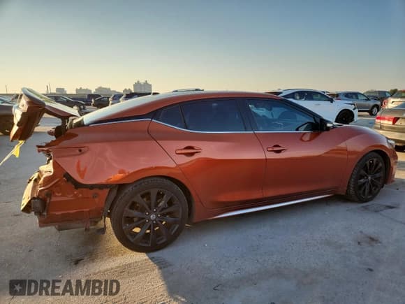 ✅ 2020 Nissan Maxima SR • VIN: 1N4AA6EV7LC370332 • Лот: 84280985. Опубликован ранее на Copart с пробегом 98 838 миль. Бесплатный доступ к архиву аукционных продаж из США и подробный отчёт об истории автомобиля на DreamBid. Изображение 3.