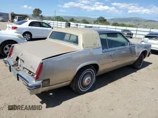 ✅ 1985 Cadillac Eldorado • VIN: 1G6EL578XFE661216 • Лот: 54606984. Опубликован ранее на Copart с пробегом 12 462 миль. Бесплатный доступ к архиву аукционных продаж из США и подробный отчёт об истории автомобиля на DreamBid. Изображение 3.