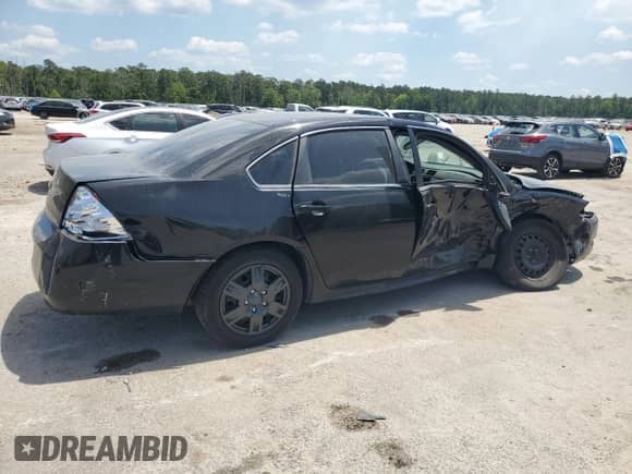 2014 Chevrolet Impala Police Police with VIN 2G1WD5E33E1107921, listed as a Copart auction lot 54584965 with Not provided miles and Salvage title. Bid and sale history available at DreamBid. Image 3.
