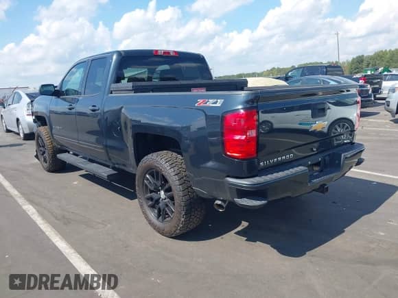 2017 Chevrolet Silverado 1500 LT with VIN 1GCVKREC6HZ229846, listed as a IAAI auction lot 43298428 with 86,125 mi miles and . Bid and sale history available at DreamBid. Image 3.