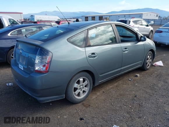 ✅ 2004 Toyota Prius • VIN: JTDKB20UX40042568 • Lot: 43476883. Listed on IAAI with 208,853 mi. Free auction sales archive from the USA and detailed vehicle history report at DreamBid. Image 4.