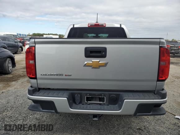 ✅ 2019 Chevrolet Colorado 2WD Work Truck • VIN: 1GCGSBEN1K1350825 • Лот: 87717925. Опубликован ранее на Copart с пробегом 67 314 миль. Бесплатный доступ к архиву аукционных продаж из США и подробный отчёт об истории автомобиля на DreamBid. Изображение 6.