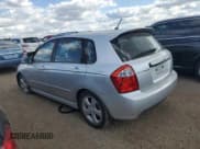 ✅ 2009 Kia Spectra Spectra5 • VIN: KNAFE241195023469 • Lot: 84055165. Listed on Copart with 142,357 mi. Free auction sales archive from the USA and detailed vehicle history report at DreamBid. Image 2.