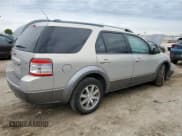 ✅ 2009 Ford Taurus X SEL • VIN: 1FMDK02W59GA02033 • Lot: 55994975. Wystawiony na Copart z przebiegiem 268 089 mil. Bezpłatny archiwum sprzedaży aukcyjnych z USA i szczegółowy raport historii pojazdu na DreamBid. Zdjęcie 3.