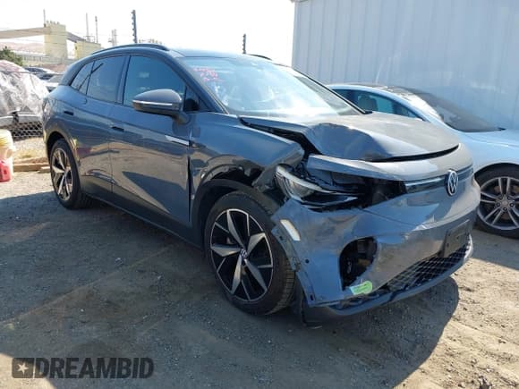 ✅ 2023 Volkswagen ID.4 Pro S • VIN: 1V2WNPE84PC026742 • Lot: 42712014. Listed on IAAI with 27,887 mi. Free auction sales archive from the USA and detailed vehicle history report at DreamBid. Image 1.