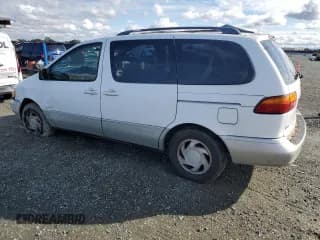 ✅ 2000 Toyota Sienna LE • VIN: 4T3ZF13C9YU289128 • Лот: 86704025. Опубликован ранее на Copart с пробегом 153 250 миль. Бесплатный доступ к архиву аукционных продаж из США и подробный отчёт об истории автомобиля на DreamBid. Изображение 2.