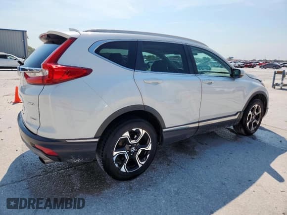 ✅ 2017 Honda CR-V Touring • VIN: 5J6RW2H99HL051781 • Лот: 69451775. Опубликован ранее на Copart с пробегом 86 255 миль. Бесплатный доступ к архиву аукционных продаж из США и подробный отчёт об истории автомобиля на DreamBid. Изображение 3.