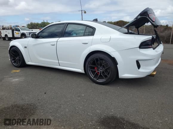 ✅ 2021 Dodge Charger Scat Pack Widebody • VIN: 2C3CDXGJ0MH621740 • Lot: 68897065. Listed on Copart with 25,949 mi. Free auction sales archive from the USA and detailed vehicle history report at DreamBid. Image 2.