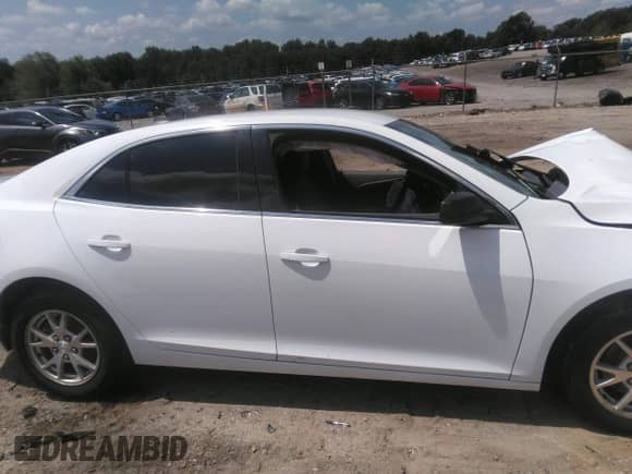 2014 Chevrolet Malibu LS z VIN 1G11A5SL1EF146619, wystawiony jako IAAI lot #42693739 z przebiegiem Nie podano mil oraz . Historia ofert i sprzedaży dostępna na DreamBid. Obrazek 13.