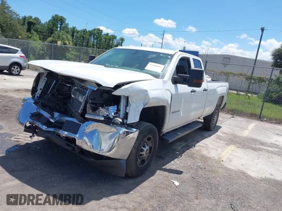 ✅ 2019 Chevrolet Silverado 2500HD Work Truck • VIN: 2GC2CREG7K1136112 • Lot: 42486087. Listed on IAAI with 99,977 mi. Free auction sales archive from the USA and detailed vehicle history report at DreamBid. Image 2.