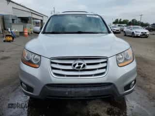 ✅ 2010 Hyundai Santa Fe Limited • VIN: 5NMSKDAG1AH387441 • Lot: 64992575. Wystawiony na Copart z przebiegiem 195 523 mil mil. Skorzystaj z bezpłatnego archiwum sprzedaży aukcyjnych z USA i zobacz szczegółowy raport historii pojazdu na DreamBid. Zdjęcie 5.