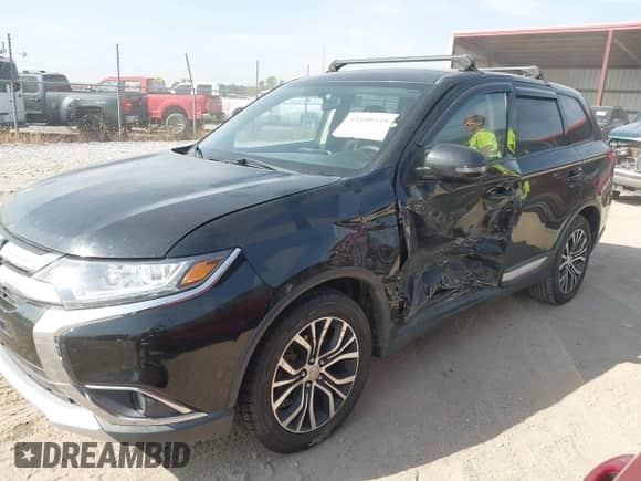 2018 Mitsubishi Outlander SE with VIN JA4AD3A31JJ004065, listed as a IAAI auction lot 43190539 with 160,381 mi miles and . Bid and sale history available at DreamBid. Image 2.