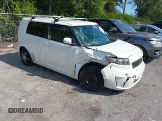 ✅ 2009 Scion xB • VIN: JTLKE50E591086548 • Lot: 43736067. Listed on IAAI with 182,193 mi. Free auction sales archive from the USA and detailed vehicle history report at DreamBid. Image 1.