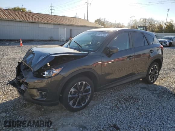 ✅ 2016 Mazda CX-5 Grand Touring • VIN: JM3KE4DY0G0839472 • Lot: 90935215. Wystawiony na Copart z przebiegiem 71 099 mil. Bezpłatny archiwum sprzedaży aukcyjnych z USA i szczegółowy raport historii pojazdu na DreamBid. Zdjęcie 1.