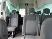 ✅ 2023 Ford Transit Passenger XL • VIN: 1FBAX2X86PKB35851 • Lot: 71126324. Wystawiony na Copart z przebiegiem 8 402 mil. Bezpłatny archiwum sprzedaży aukcyjnych z USA i szczegółowy raport historii pojazdu na DreamBid. Zdjęcie 10.