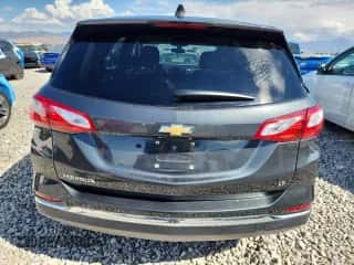 ✅ 2018 Chevrolet Equinox LT • VIN: 2GNAXJEV8J6290370 • Lot: 84430465. Wystawiony na Copart z przebiegiem 113 705 mil mil. Skorzystaj z bezpłatnego archiwum sprzedaży aukcyjnych z USA i zobacz szczegółowy raport historii pojazdu na DreamBid. Zdjęcie 6.