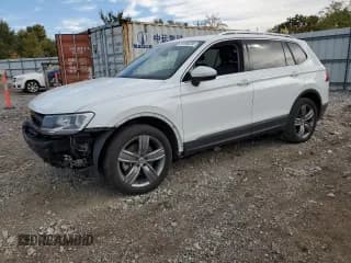 ✅ 2021 Volkswagen Tiguan SE • VIN: 3VV2B7AX0MM136673 • Lot: 90068205. Wystawiony na Copart z przebiegiem 118 827 mil. Bezpłatny archiwum sprzedaży aukcyjnych z USA i szczegółowy raport historii pojazdu na DreamBid. Zdjęcie 1.