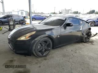 ✅ 2009 Nissan 370Z Touring • VIN: JN1AZ44E59M401771 • Lot: 71959725. Listed on Copart with 85,677 mi. Free auction sales archive from the USA and detailed vehicle history report at DreamBid. Image 1.