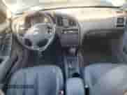 2004 Hyundai Elantra GT z VIN KMHDN56D84U108029, wystawiony jako Copart lot #76633414 z przebiegiem 105 315 mil mil oraz Czysty tytuł • Clean title. Historia ofert i sprzedaży dostępna na DreamBid. Obrazek 8.