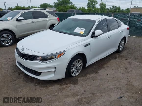 ✅ 2018 Kia Optima S • VIN: 5XXGT4L38JG184817 • Lot: 42317810. Listed on IAAI with 98,734 mi. Free auction sales archive from the USA and detailed vehicle history report at DreamBid. Image 2.