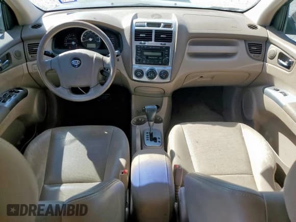 ✅ 2006 Kia Sportage LX • VIN: KNDJF723367253168 • Lot: 80826505. Listed on Copart with 130,901 mi. Free auction sales archive from the USA and detailed vehicle history report at DreamBid. Image 8.