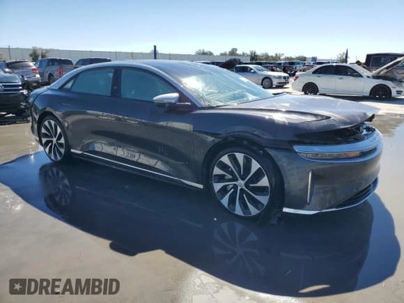 ✅ 2023 Lucid Air Grand Touring • VIN: 50EA1GBA1PA005532 • Lot: 76828684. Wystawiony na Copart z przebiegiem Nie podano. Bezpłatny archiwum sprzedaży aukcyjnych z USA i szczegółowy raport historii pojazdu na DreamBid. Zdjęcie 4.