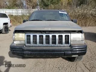 ✅ 1998 Jeep Grand Cherokee Laredo • VIN: 1J4GZ48YXWC299827 • Лот: 76898264. Опубликован ранее на Copart с пробегом 232 656 миль. Бесплатный доступ к архиву аукционных продаж из США и подробный отчёт об истории автомобиля на DreamBid. Изображение 5.