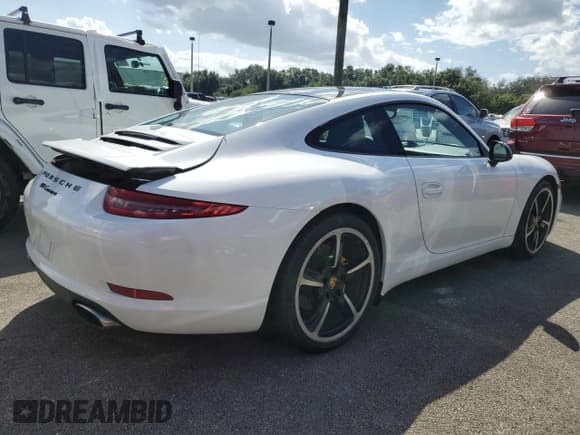 ✅ 2015 Porsche 911 Carrera • VIN: WP0AA2A98FS106770 • Лот: 74740294. Опубликован ранее на Copart с пробегом Не указан. Бесплатный доступ к архиву аукционных продаж из США и подробный отчёт об истории автомобиля на DreamBid. Изображение 3.