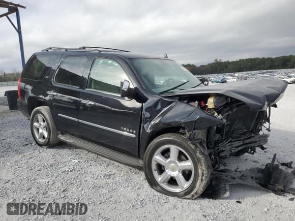 ✅ 2012 Chevrolet Tahoe LTZ • VIN: 1GNSCCE08CR279697 • Lot: 79423014. Listed on Copart with 217,990 mi. Free auction sales archive from the USA and detailed vehicle history report at DreamBid. Image 4.
