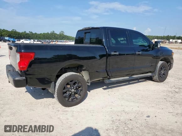 ✅ 2018 Nissan Titan Platinum Reserve • VIN: 1N6BA1F43JN525223 • Lot: 67204495. Listed on Copart with 112,352 mi. Free auction sales archive from the USA and detailed vehicle history report at DreamBid. Image 3.