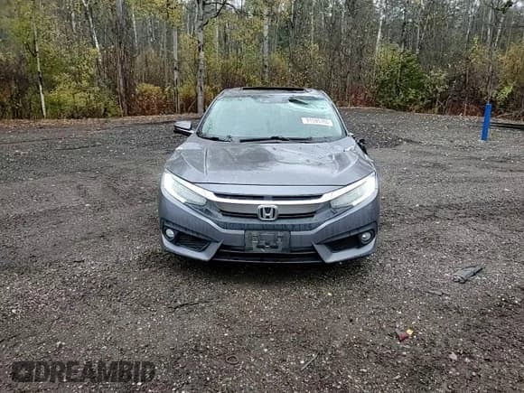 ✅ 2016 Honda Civic Touring • VIN: 2HGFC1F97GH114386 • Lot: 91595765. Listed on Copart with 238,268 mi. Free auction sales archive from the USA and detailed vehicle history report at DreamBid. Image 13.