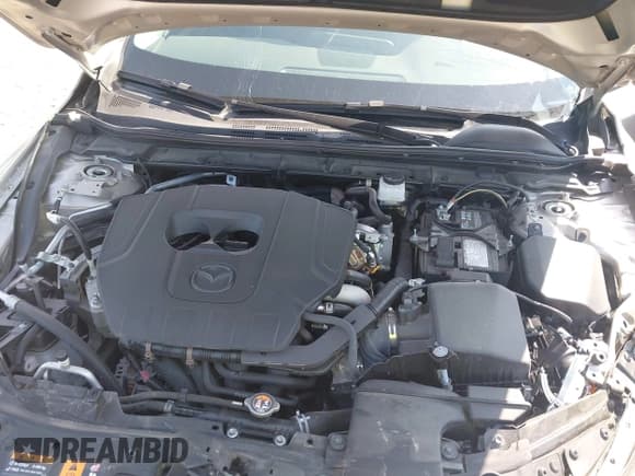 ✅ 2024 Mazda 3 S Preferred • VIN: 3MZBPACM0RM402567 • Лот: 43137383. Опубликован ранее на IAAI с пробегом 22 250 миль. Бесплатный доступ к архиву аукционных продаж из США и подробный отчёт об истории автомобиля на DreamBid. Изображение 10.