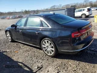 ✅ 2015 Audi A8 4.0T • VIN: WAU32AFDXFN034835 • Лот: 40891264. Опубликован ранее на Copart с пробегом 106 143 миль. Бесплатный доступ к архиву аукционных продаж из США и подробный отчёт об истории автомобиля на DreamBid. Изображение 2.