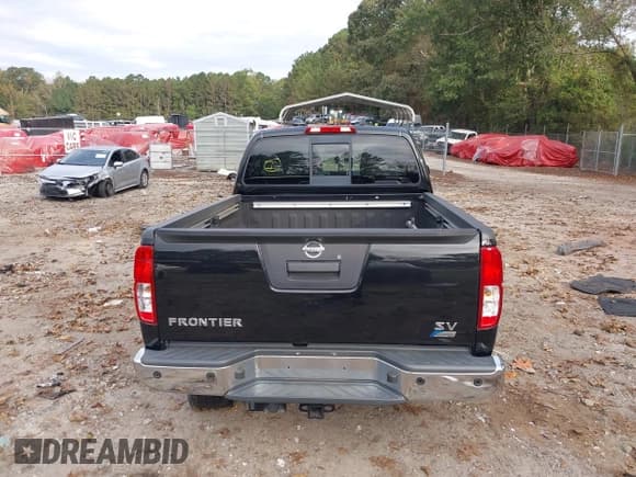 ✅ 2018 Nissan Frontier SV • VIN: 1N6DD0FR1JN718086 • Lot: 43400695. Listed on IAAI with 127,928 mi. Free auction sales archive from the USA and detailed vehicle history report at DreamBid. Image 15.