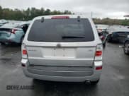 ✅ 2009 Mercury Mariner • VIN: 4M2CU91729KJ15969 • Lot: 86498475. Wystawiony na Copart z przebiegiem 162 788 mil. Bezpłatny archiwum sprzedaży aukcyjnych z USA i szczegółowy raport historii pojazdu na DreamBid. Zdjęcie 6.