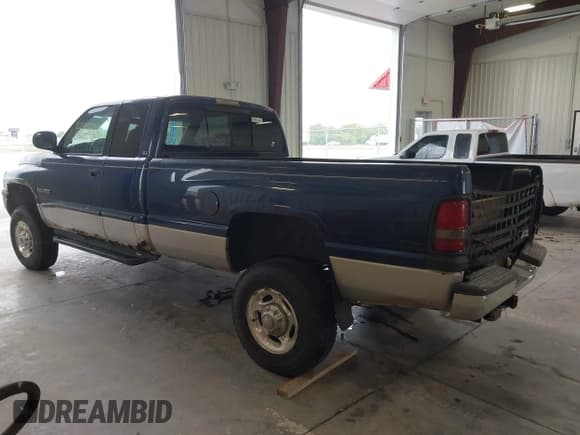 ✅ 2001 Dodge 2500 • VIN: 3B7KF23661G209341 • Lot: 43267266. Listed on IAAI with 325,483 mi. Free auction sales archive from the USA and detailed vehicle history report at DreamBid. Image 3.
