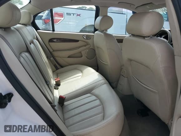 ✅ 2002 Jaguar X-Type • VIN: SAJEA51D52XC65366 • Lot: 63870905. Wystawiony na Copart z przebiegiem 55 607 mil. Bezpłatny archiwum sprzedaży aukcyjnych z USA i szczegółowy raport historii pojazdu na DreamBid. Zdjęcie 10.