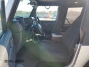 ✅ 2006 Jeep Wrangler X • VIN: 1J4FA39S56P770203 • Lot: 87086945. Listed on Copart with 128,489 mi. Free auction sales archive from the USA and detailed vehicle history report at DreamBid. Image 7.