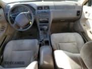 ✅ 1996 Nissan Maxima GXE • VIN: JN1CA21D9TT153084 • Lot: 81176414. Listed on Copart with 194,510 mi. Free auction sales archive from the USA and detailed vehicle history report at DreamBid. Image 8.