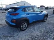 ✅ 2021 Hyundai Kona SE • VIN: KM8K1CAA6MU604841 • Лот: 77482353. Опубликован ранее на Copart с пробегом 56 659 миль. Бесплатный доступ к архиву аукционных продаж из США и подробный отчёт об истории автомобиля на DreamBid. Изображение 3.