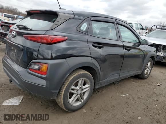 ✅ 2019 Hyundai Kona SE • VIN: KM8K12AA7KU385010 • Лот: 41196924. Опубликован ранее на Copart с пробегом 185 925 миль. Бесплатный доступ к архиву аукционных продаж из США и подробный отчёт об истории автомобиля на DreamBid. Изображение 3.