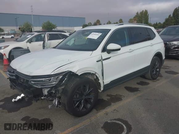 ✅ 2022 Volkswagen Tiguan SE • VIN: 3VV3B7AX2NM020185 • Lot: 42956464. Listed on IAAI with 31,023 mi. Free auction sales archive from the USA and detailed vehicle history report at DreamBid. Image 16.