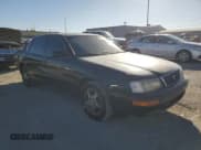 ✅ 1997 Toyota Avalon XL • VIN: 4T1BF12B5VU140651 • Lot: 84292945. Listed on Copart with 381,855 mi. Free auction sales archive from the USA and detailed vehicle history report at DreamBid. Image 4.