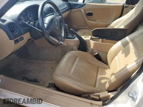 ✅ 1999 Mazda MX-5 Miata • VIN: JM1NB3539X0136190 • Lot: 82707195. Listed on Copart with 109,300 mi. Free auction sales archive from the USA and detailed vehicle history report at DreamBid. Image 7.