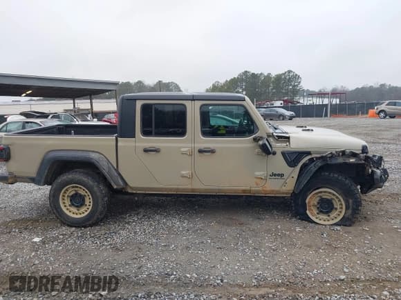 ✅ 2020 Jeep Gladiator Sport S • VIN: 1C6HJTAG2LL184767 • Лот: 41549812. Опубликован ранее на IAAI с пробегом 79 728 миль. Бесплатный доступ к архиву аукционных продаж из США и подробный отчёт об истории автомобиля на DreamBid. Изображение 14.