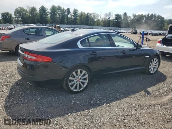 ✅ 2014 Jaguar XF SC • VIN: SAJWJ0EFXE8U21044 • Lot: 70684985. Listed on Copart with 85,325 mi. Free auction sales archive from the USA and detailed vehicle history report at DreamBid. Image 3.