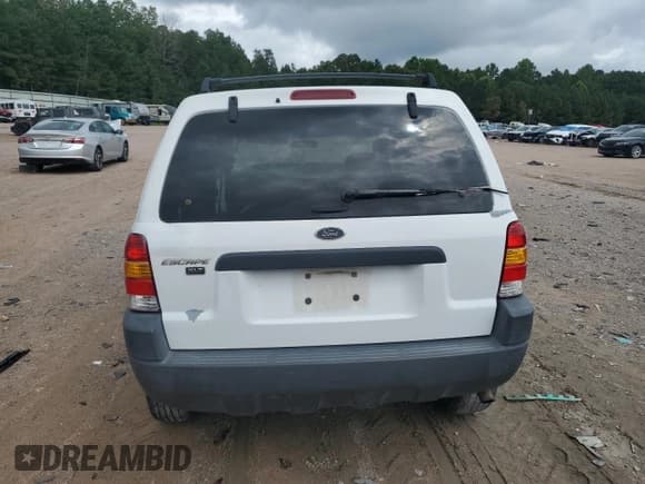 ✅ 2003 Ford Escape XLT Popular • VIN: 1FMYU03173KC63585 • Lot: 63828115. Listed on Copart with Not provided. Free auction sales archive from the USA and detailed vehicle history report at DreamBid. Image 6.