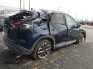 ✅ 2016 Mazda CX-5 Grand Touring • VIN: JM3KE2DY8G0885958 • Lot: 43369411. Wystawiony na IAAI z przebiegiem 171 093 mil. Bezpłatny archiwum sprzedaży aukcyjnych z USA i szczegółowy raport historii pojazdu na DreamBid. Zdjęcie 4.